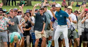 Golfer Celebrationwith Crowd Wallpaper