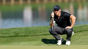 Golfer Evaluating Putt The Players Championship Wallpaper