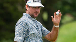 Golfer Jb Holmes With Ping Cap Wallpaper