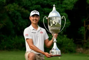 Golfer Min Woo Lee Trophy Celebration Wallpaper