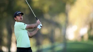 Golfer Swinging Clubat The Players Championship Wallpaper