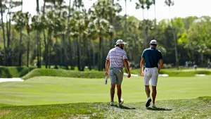 Golfers Walking The Fairwayat The Players Championship Wallpaper