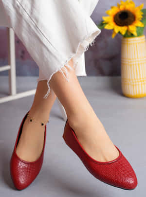 Gorgeous Red Shoes On A Picturesque Background Wallpaper