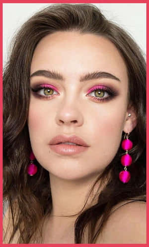 Gorgeous Woman Flaunting A Fresh And Vibrant Spring Makeup Look Wallpaper