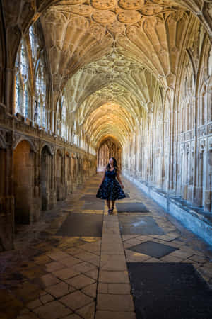 Gothic_ Architecture_ Corridor_with_ Woman Wallpaper