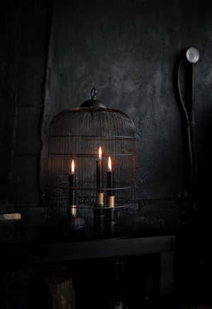 Gothic Candlelit Birdcage Halloween Decor Wallpaper