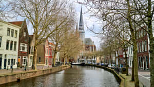 Gouda Historic Canal View Netherlands Wallpaper