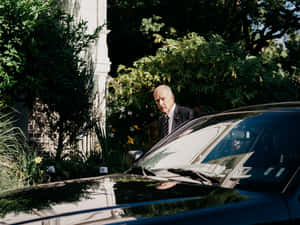 Governor Jerry Brown Of California Getting Out Of His Car Wallpaper