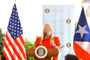 Governor Wanda Vázquez Garced In Red Wallpaper