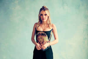 Grace Van Dien Posing For A Photoshoot Wallpaper