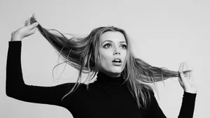 Grace Van Dien Striking A Confident Pose Wallpaper