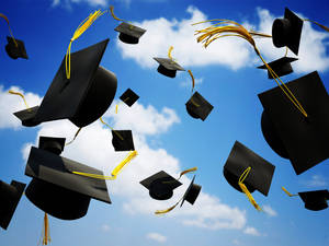 Graduation Cap In Cloudy Sky Wallpaper