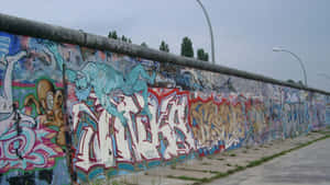 Graffiti Mural In Berlin Wall Wallpaper