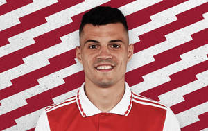 Granit Xhaka In Red-white Pattern Wallpaper
