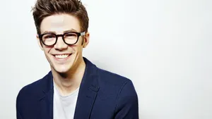 Grant Gustin Cool In Glasses Wallpaper