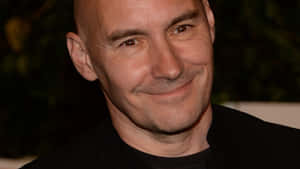 Grant Morrison, Acclaimed Comic Book Writer And Visionary Wallpaper