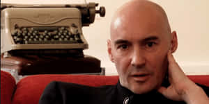 Grant Morrison At A Book Signing Event Wallpaper