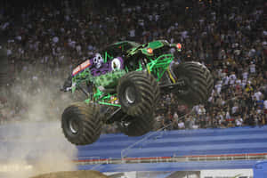 Grave Digger Monster Truck With Onlookers Wallpaper