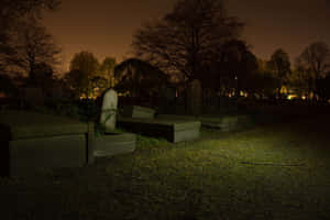 Gravestone In Mysterious Atmosphere Wallpaper