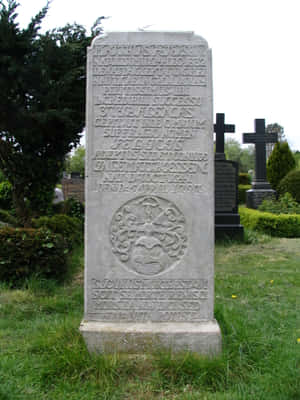 Gravestone On A Foggy And Serene Evening Wallpaper