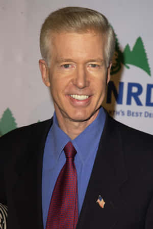 Gray Davis Smilingat Event Wallpaper