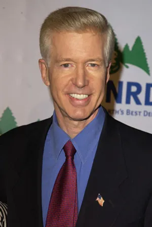 Gray Davis Smilingat Event Wallpaper
