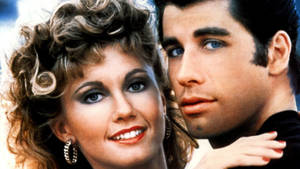 Grease Stars John And Olivia Wallpaper