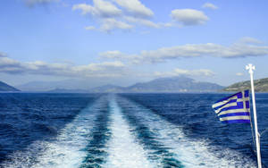 Greek Flag On A Boat Wallpaper