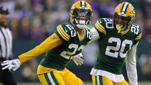 Green Bay Defensive Backsin Action Wallpaper