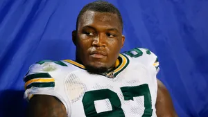 Green Bay Packers Kenny Clark In Soldier Field Wallpaper