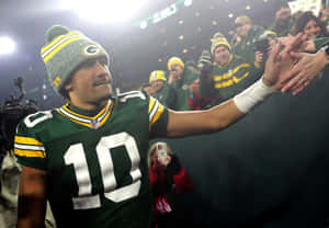 Green Bay Packers Player High Fiving Fans Wallpaper