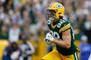 Green Bay Packers Player In Action Wallpaper