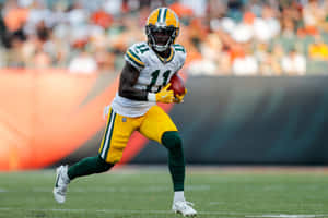 Green Bay Packers Player Running With Football Wallpaper