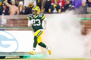 Green Bay Packers Player Runningon Field Wallpaper