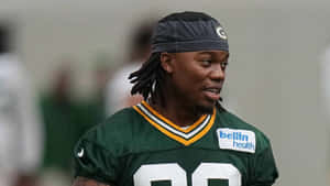 Green Bay Packers Player Smiling During Training Wallpaper