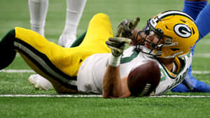 Green Bay Wide Receiver Catch Attempt Wallpaper