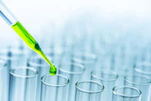 Green Chemistry Concept In Laboratory Wallpaper