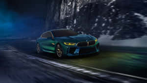 Green Coupe Speeding Past Mountain Wallpaper