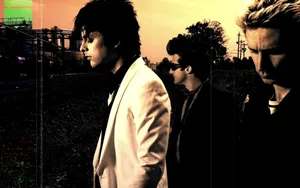 Green Day Members Looking Down Wallpaper
