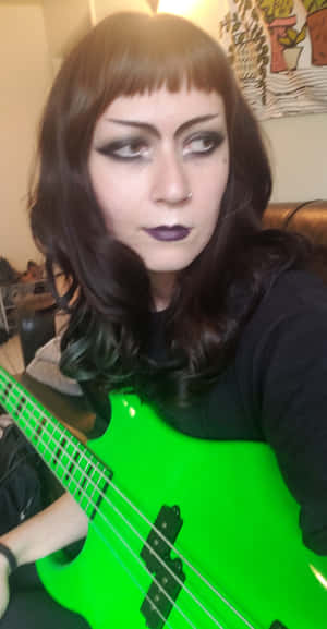 Green Goth Bass Guitarist Selfie Wallpaper