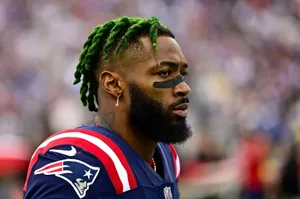 Green Haired Football Playerin Uniform Wallpaper