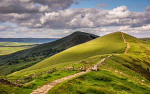 Green Hillside Country Road Wallpaper