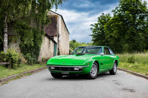 Green Lamborghini Islero Countryside Road Wallpaper