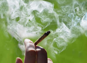 Green-life: Smoking A Freshly Rolled Weed Blunt Wallpaper