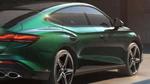 Green Luxury Coupe Sunlight Reflection Wallpaper