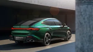 Green M G7 Sports Sedan Rear View Wallpaper