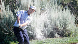 Greg Chalmers Hitting Ball With Sand Wallpaper