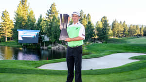 Greg Chalmers Holds Trophy Wallpaper