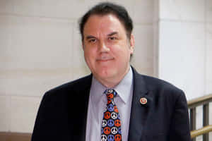 Griining Face Alan Grayson Wallpaper