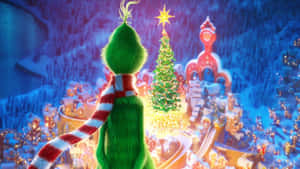 Grinch Overlooking Whoville Christmas Wallpaper